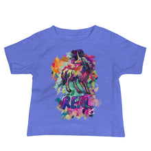 Load image into Gallery viewer, A beautiful blue tee for babies with a drawing of a mystical unicorn with its head cocked backwards and the word &quot;Real&quot; below the unicorn. It&#39;s made by Real Unicorn Apparel and is perfect for your baby.
