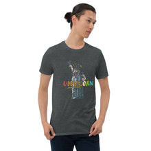 Load image into Gallery viewer, A male model wearing a dark heather-colored &quot;uNYCorn&quot; t-shirt from Real Unicorn Apparel. The shirt imagines the Statue of Liberty, one of New York City&#39;s iconic monuments, as a unicorn.
