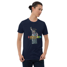 Load image into Gallery viewer, An Asian man with his hair tied in a back bun who is wearing a shirt from Real Unicorn Apparel. The shirt is of the Statue of Liberty as a unicorn with the text &quot;uNYCorn&quot; superimposed.
