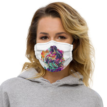 Load image into Gallery viewer, A blonde woman wearing a face mask from Real Unicorn Apparel to prevent COVID-19. The facemask has a unicorn and the word &quot;REAL&quot; as its design.
