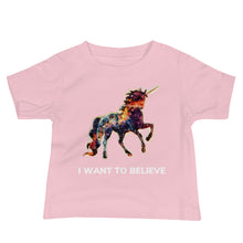 Load image into Gallery viewer, A pink &quot;I Want To Believe&quot; Baby Jersey Short Sleeve Tee from Real Unicorn Apparel. It features a rainbow-colored unicorn and the phrase &quot;I Want To Believe.&quot;
