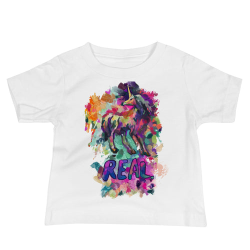 A white, baby jersey short sleeve tee from Real Unicorn Apparel. The t-shirt features a unicorn from popular folklore and the word 