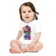 Load image into Gallery viewer, A baby boy with long brown hair who is dressed in a white one-piece t-shirt from Real Unicorn Apparel. The onesie includes a drawing of a mythological unicorn by artist Lauren Rubin and the word &quot;REAL&quot; in large letters.
