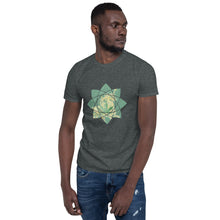 Load image into Gallery viewer, A young man with his head cocked to the side. He&#39;s wearing a shirt from Real Unicorn Apparel with a unicorn emblazoned over a stylized cannabis leaf. 
