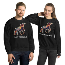 Load image into Gallery viewer, A woman resting her elbow on a man&#39;s shoulder. They are both wearing &quot;I Want To Believe&quot; sweatshirts from Real Unicorn Apparel.
