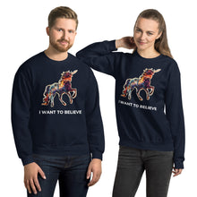 Load image into Gallery viewer, A fashionable couple wearing navy-colored &quot;I Want To Believe&quot; sweatshirts from Real Unicorn Apparel.
