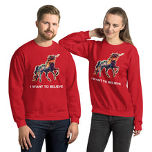 Load image into Gallery viewer, Two red sweatshirts from Real Unicorn Apparel with a rainbow-colored unicorn and the text underneath stating &quot;I Want To Believe.&quot;

