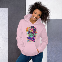 Load image into Gallery viewer, A feminine light pink Real Unicorn Unisex Hoodie from Real Unicorn Apparel worn by a model with curly hair and her head cocked to the side at a 45 degree angle.
