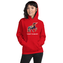 Load image into Gallery viewer, A red unisex hoodie from Real Unicorn Apparel with a bright, colorful unicorn on it and the phrase &quot;I Want to Believe.&quot; 
