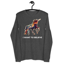 Load image into Gallery viewer, A dark grey heather-colored long-sleeve tee from Real Unicorn Apparel resting on a dark clothes hanger. The t-shirt features a beautifully-drawn unicorn and the text &quot;I Want To Believe.&quot;

